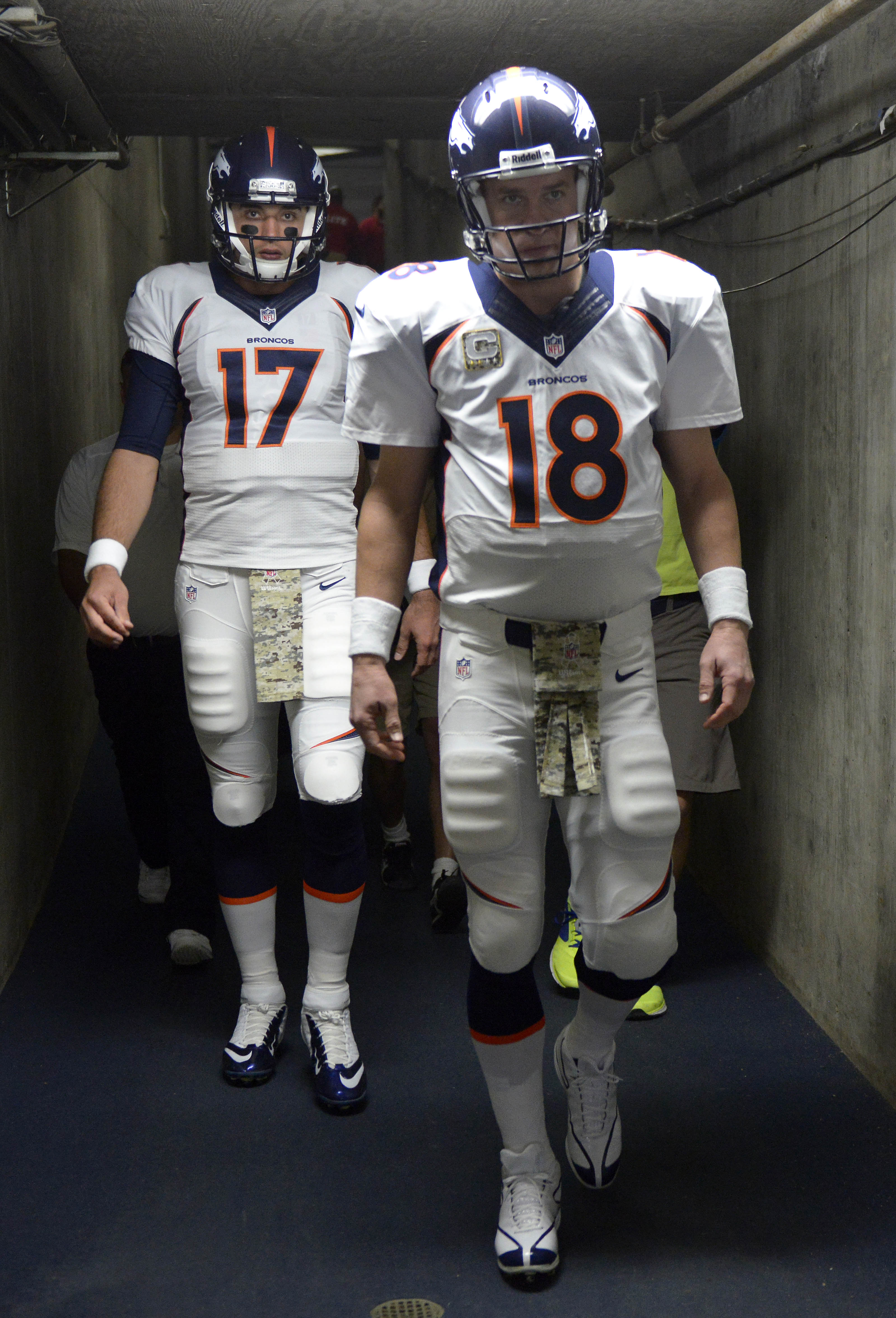 Peyton Manning of the Denver Broncos warms up prior to playing in