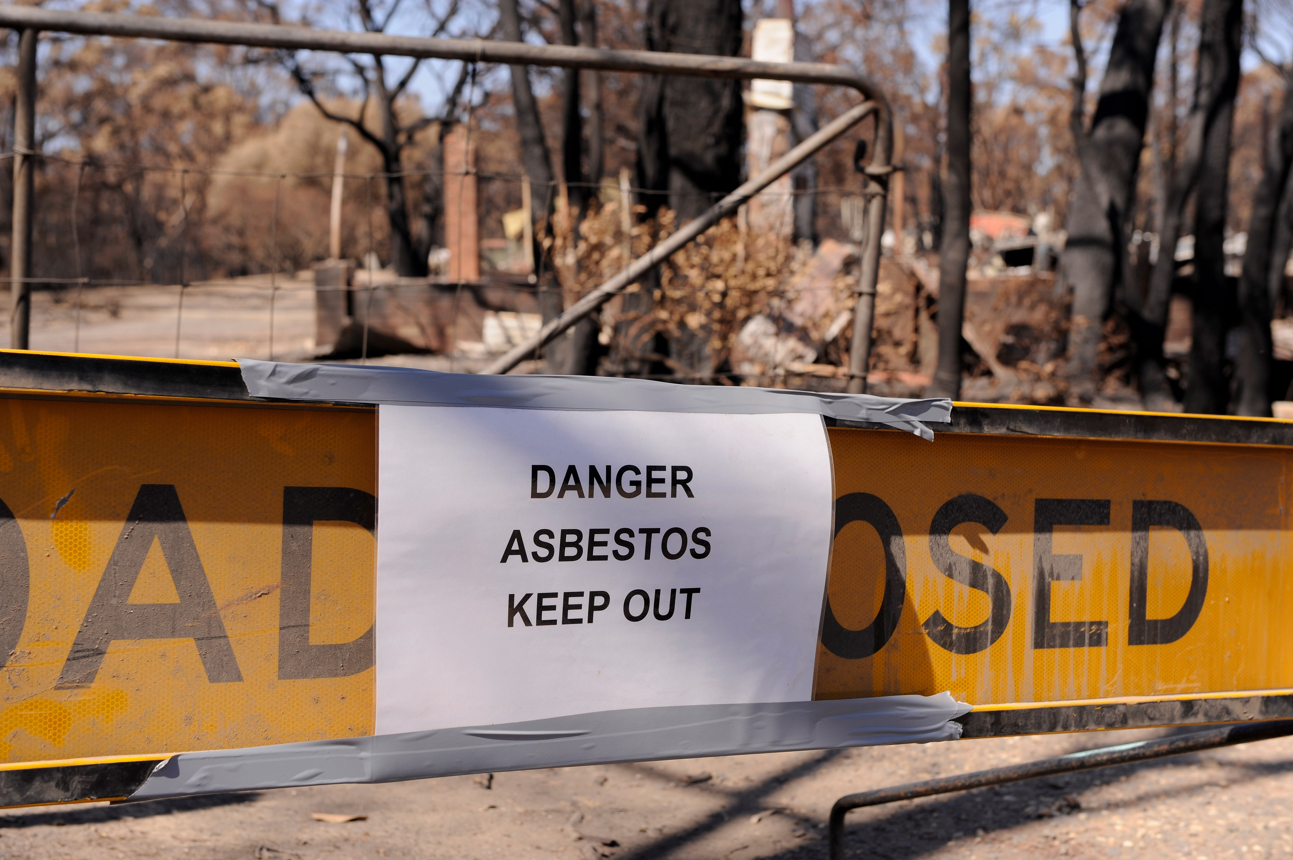 Mowing Lawns In White Suits, Gas Masks As Davidson Asbestos Cleanup Gets  Underway