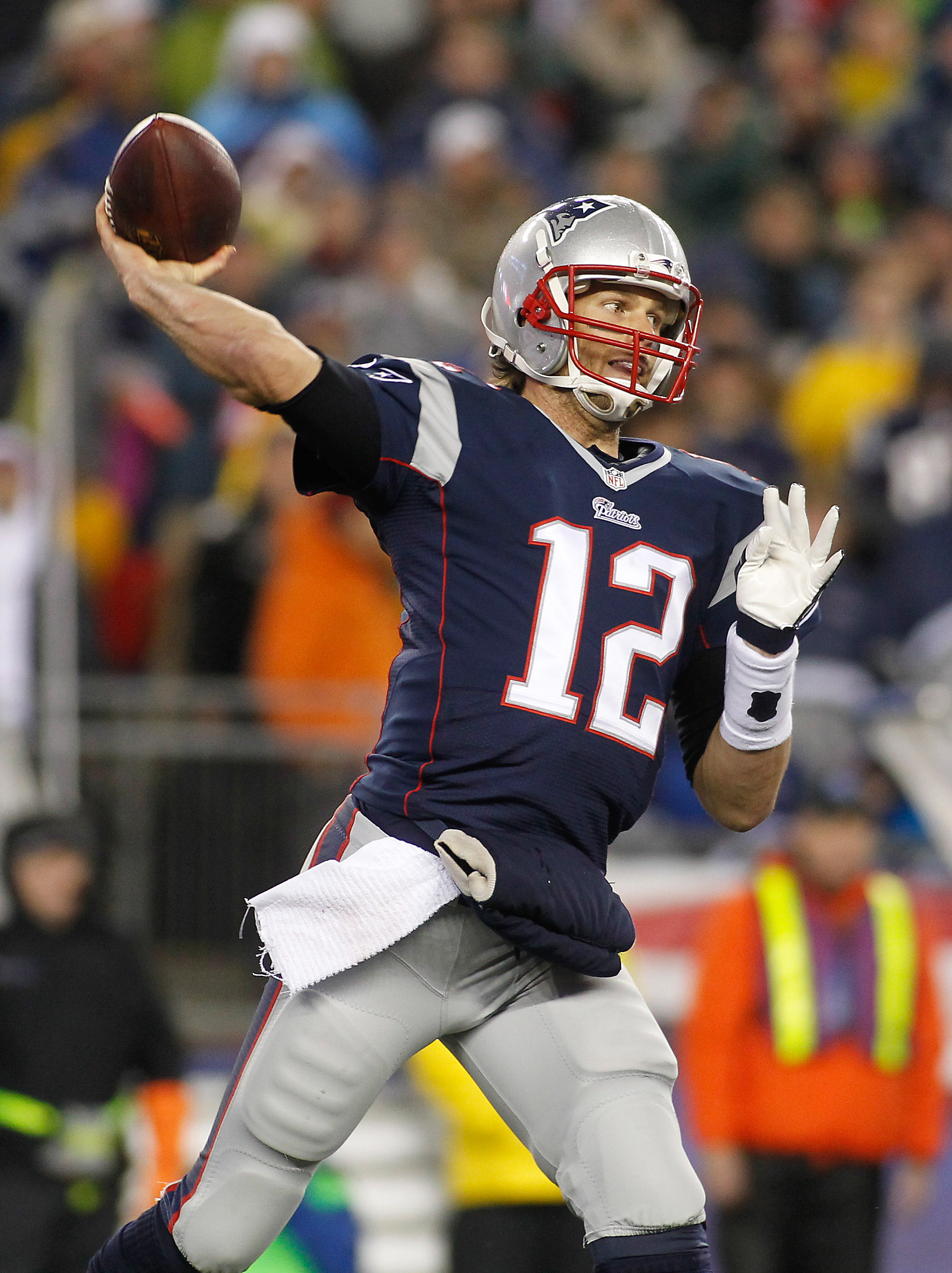 New England Patriots quarterback Tom Brady (12) throws a pass in the second  quarter against the