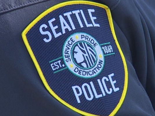 Seattle officer fired for punching woman in back of patrol car | krem.com